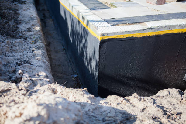 Professional Emergency Waterproofing technician working in Clinton, IL